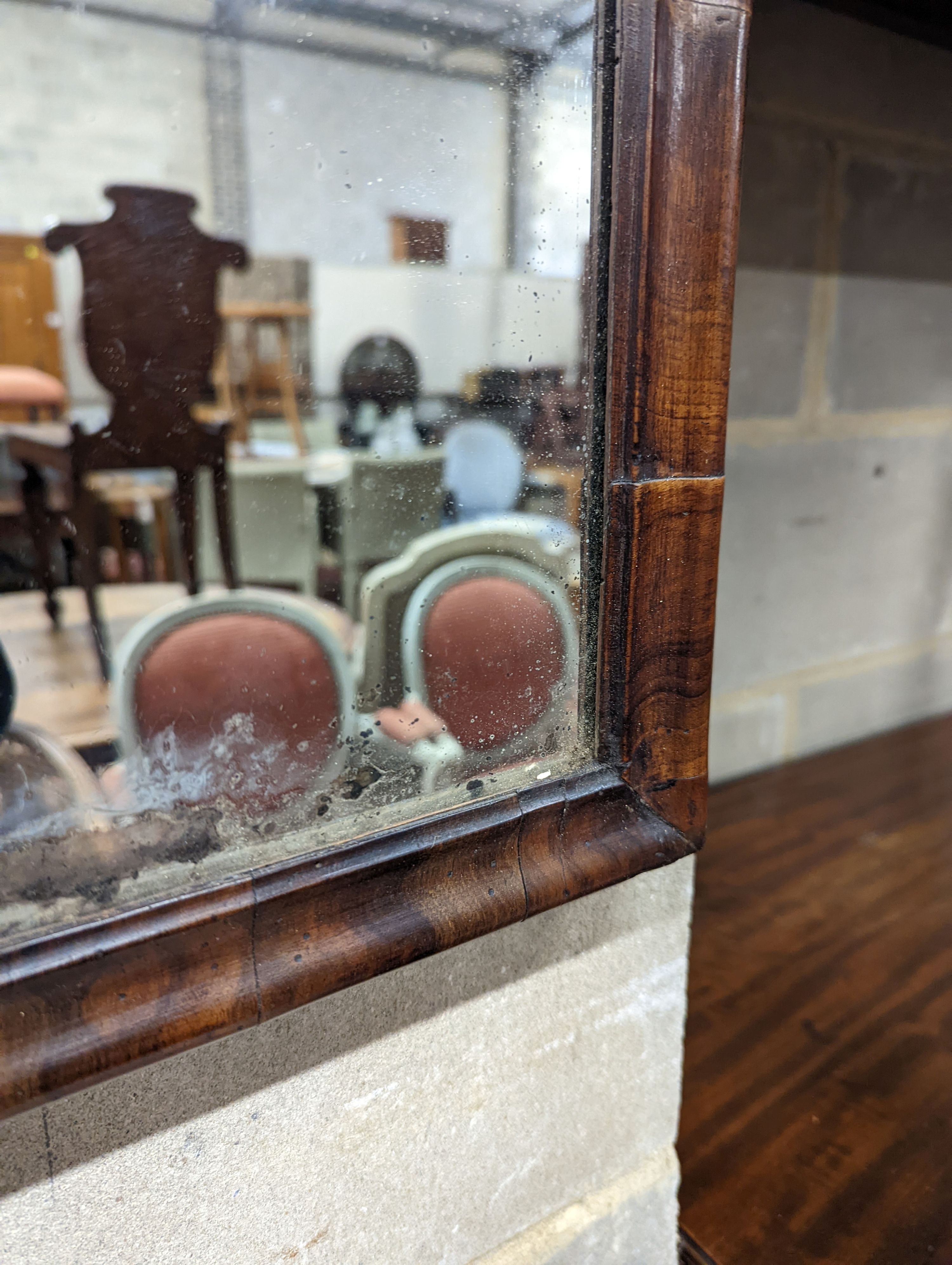 An 18th century walnut wall mirror, width 37cm, height 58cm
